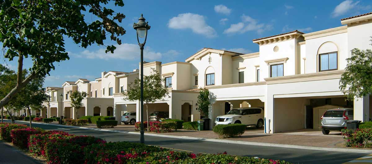 Row of identical suburban homes representing uniform housing developments in Denver Colorado interior design trends