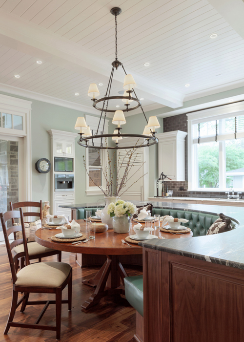 Kitchen with circular tufted banquette, Denver country club casual design